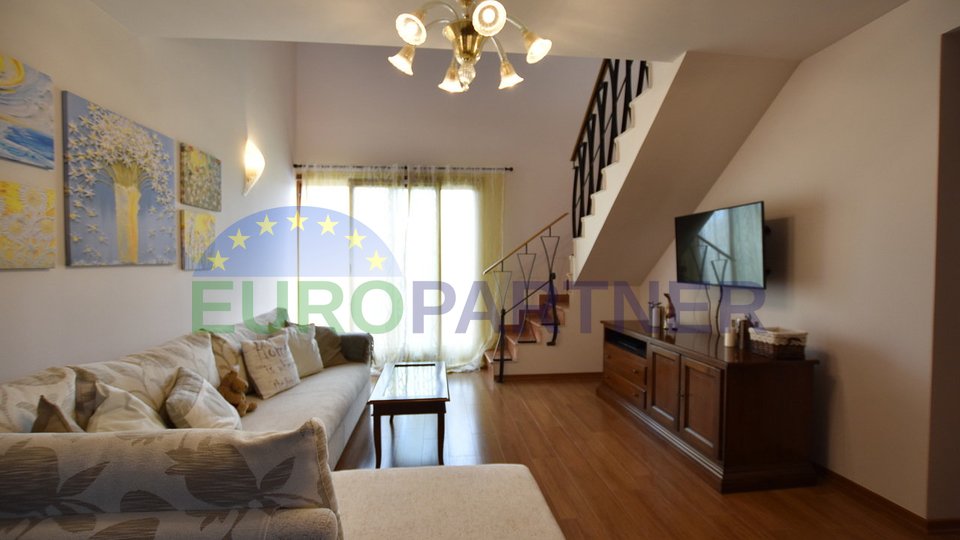 Large duplex apartment with roof terrace and panoramic sea view