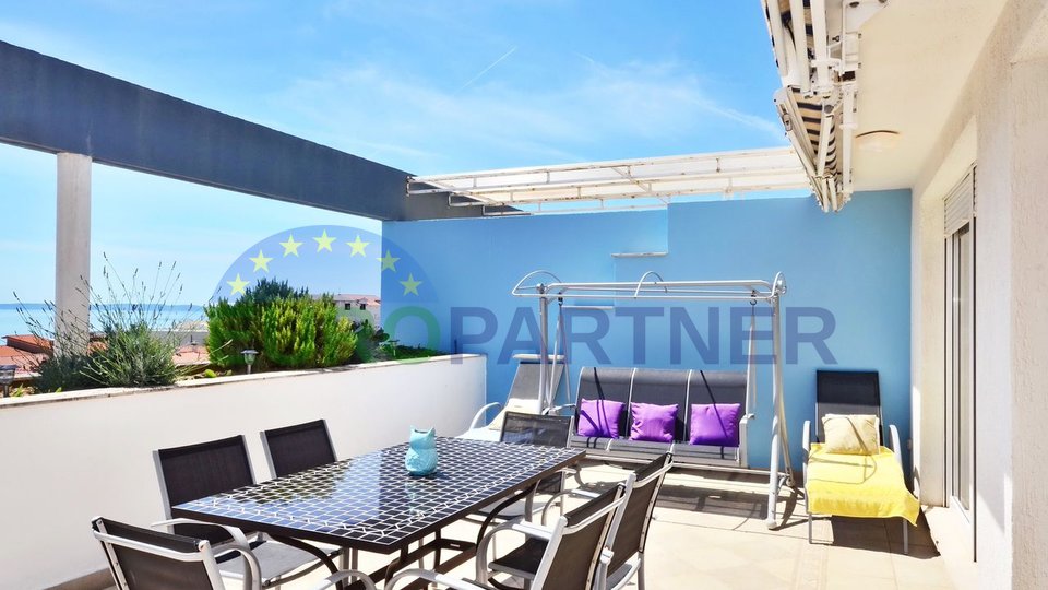 Penthouse con splendida vista sul mare