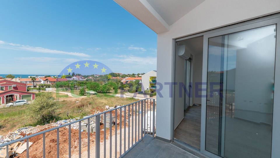 Two-story apartment with 3 bedrooms with sea view in an attractive location 300m from the beach