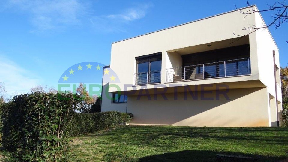 Modern house with a panoramic view of the sea and great potential, near Poreč