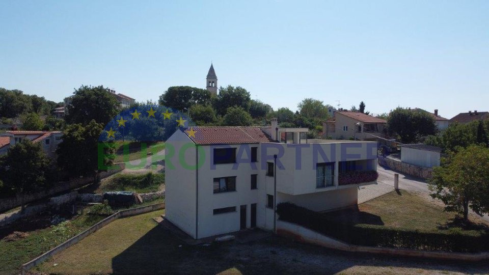 Modern house with a panoramic view of the sea and great potential, near Poreč