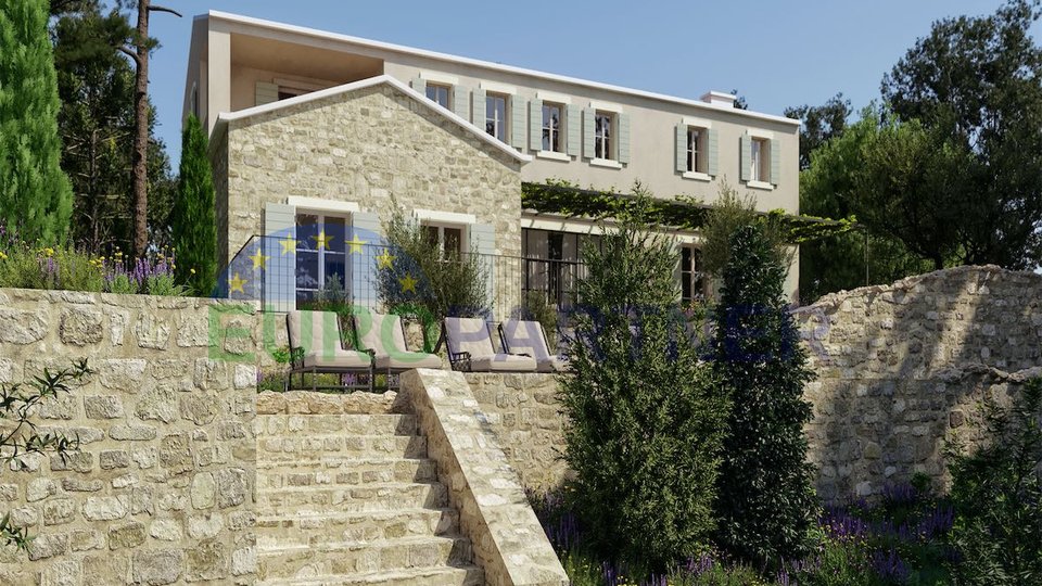 A combination of modern architecture and the foundations of an old stone house