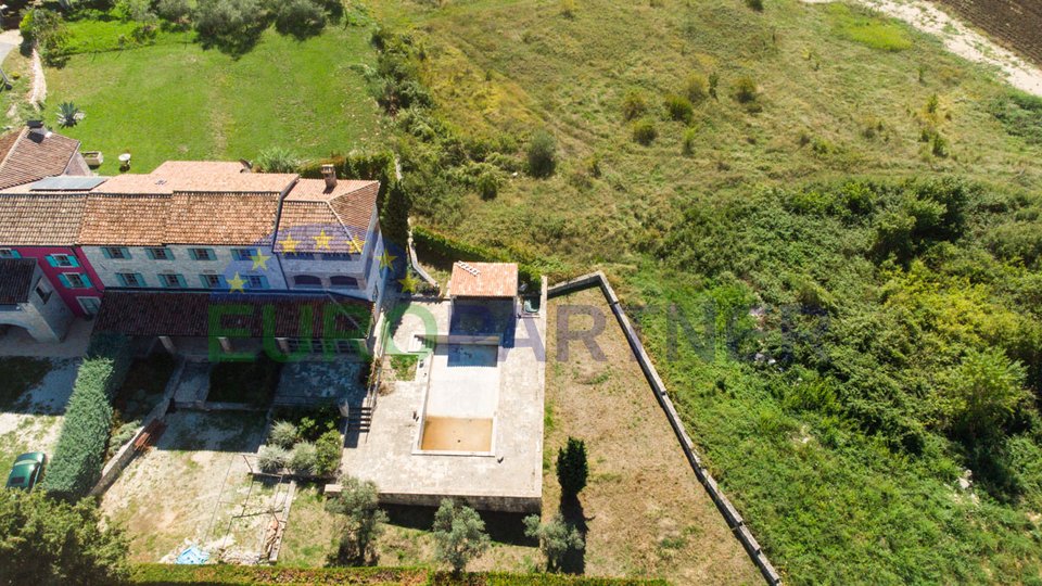 Coexistence of nature and architecture, Stone house with a view of the sea