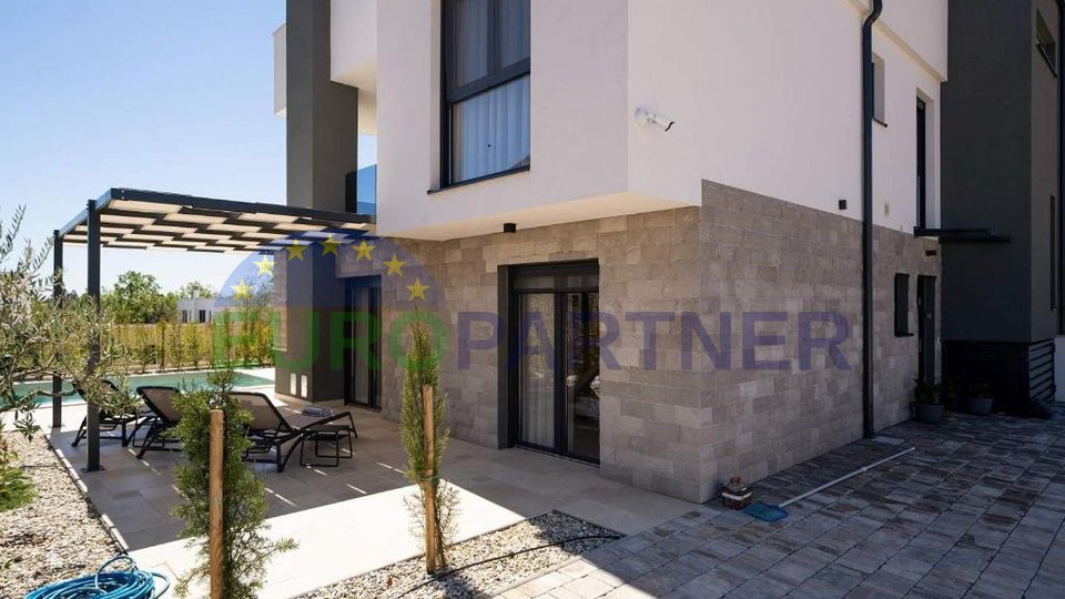 For sale, modern semi-detached villa near the sea