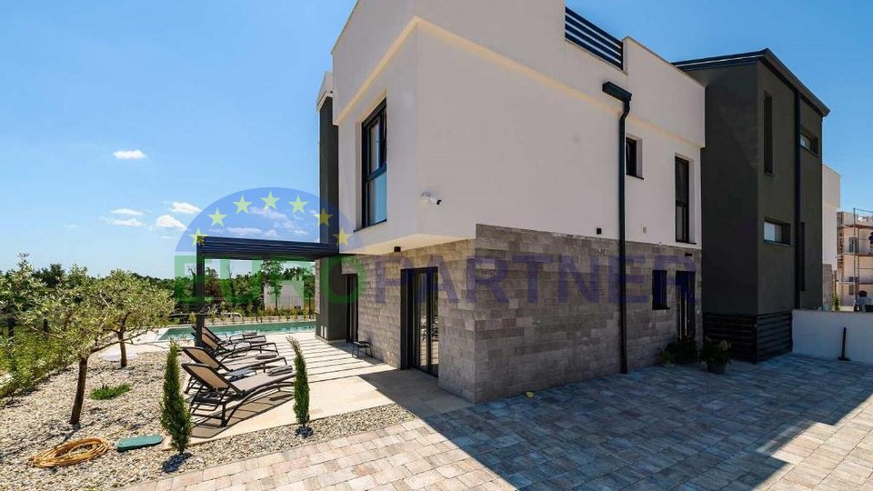 For sale, modern semi-detached villa near the sea